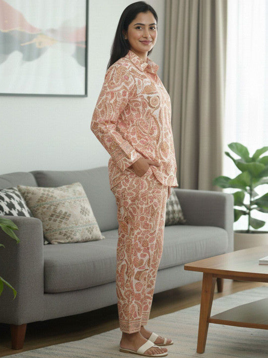 women peach printed kurta & pant set